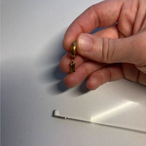 Gold Tone Hoop Earring with Small Dangling Charm